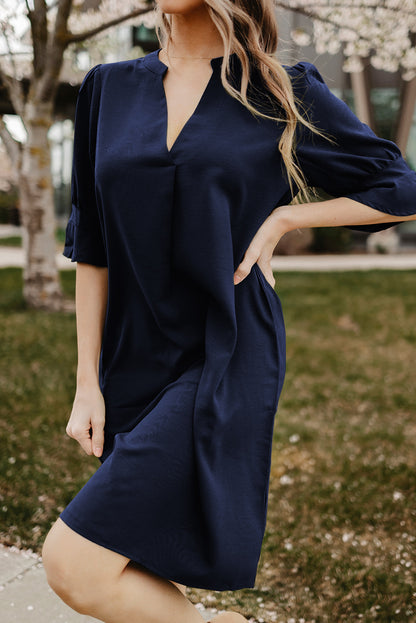 Robe droite bleue à manches volantées