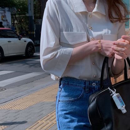 Camisa francesa de manga media con botones dorados Retro de temperamento Simple para mujer