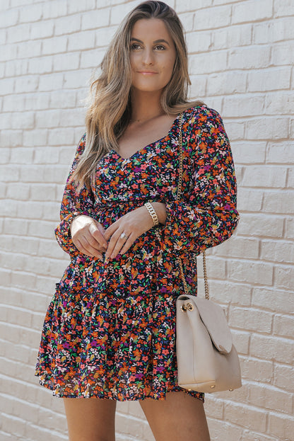 Vestido floral de manga larga con escote en V cruzado