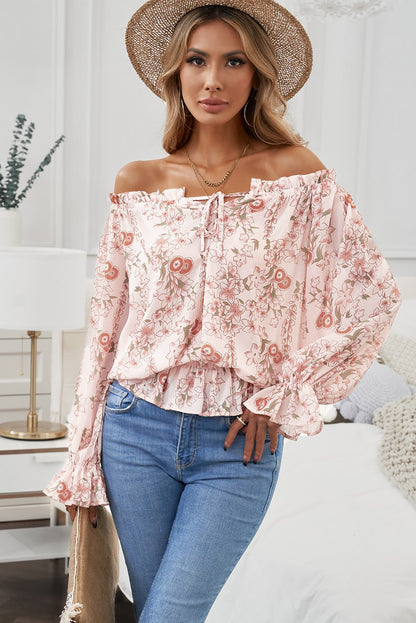 Blouse florale à épaules dénudées et à volants