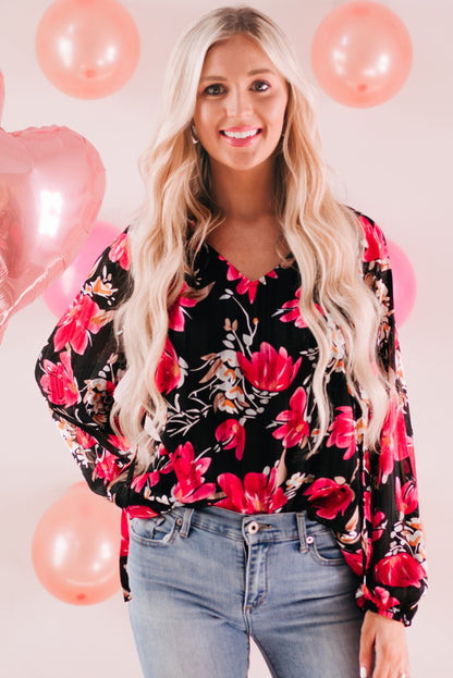 Blusa floral con cuello en V y manga globo