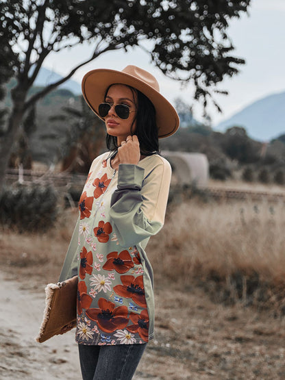 Blusa con hombros caídos y cremallera frontal con estampado floral