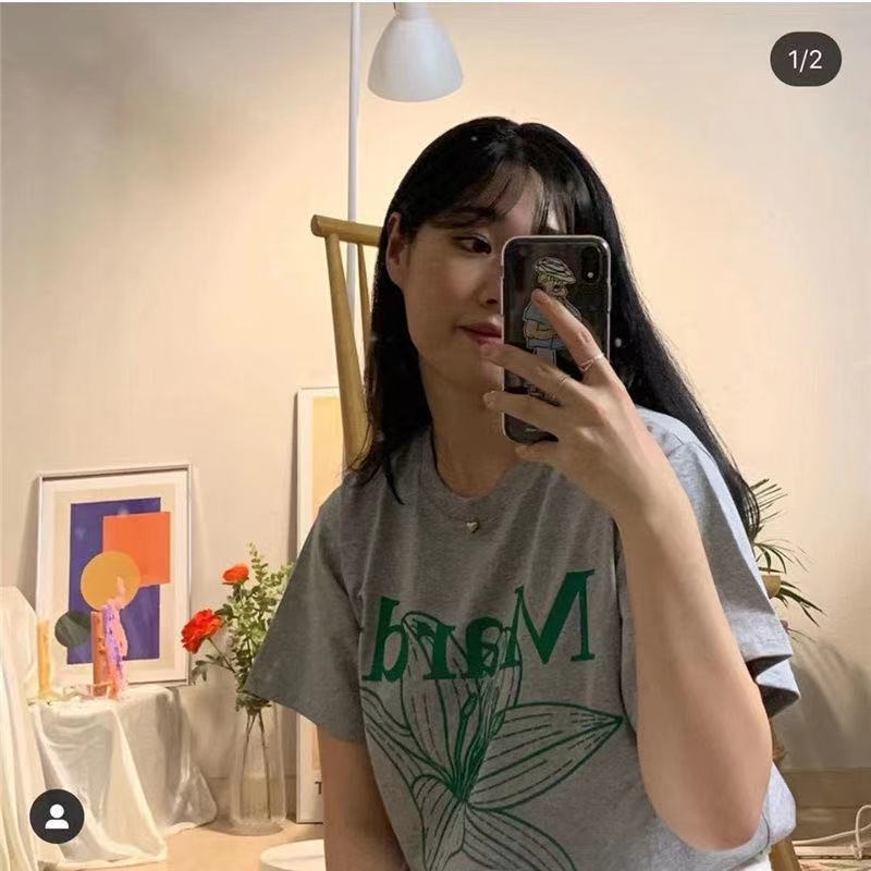 Flor verde Mujer de manga corta 21 años Nuevo diseño femenino Sense Ins Trend Flower T