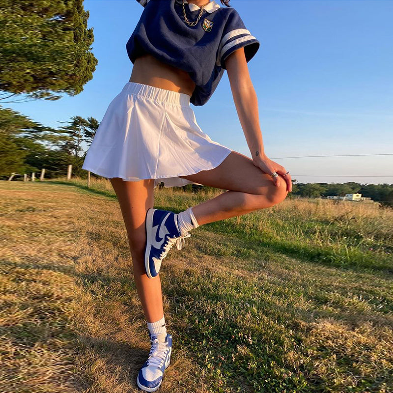 Nouveau T-shirt à manches courtes à col Polo bleu marine rétro américain pour les femmes en