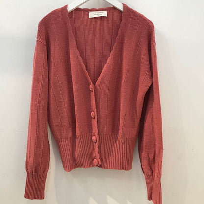 Buttoned loose knit cardigan sweater