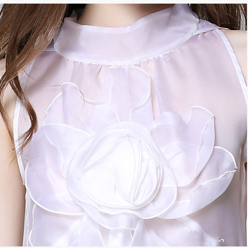 Top sin mangas de organza con volantes