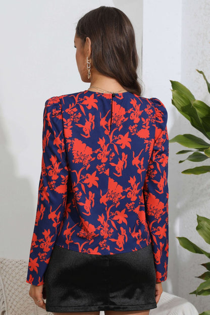 Blusa floral de manga larga abullonada