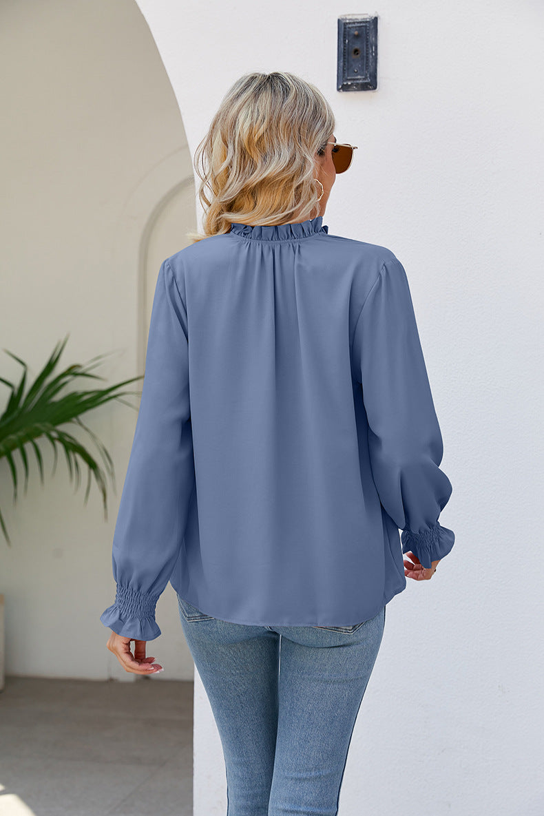 Blouse à manches volantées et col noué