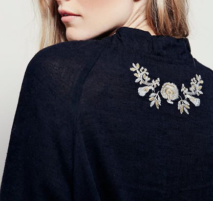 Bohemian lace-up top with embroidered flowers