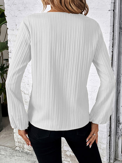 Blouse contrastée à manches longues et col en V