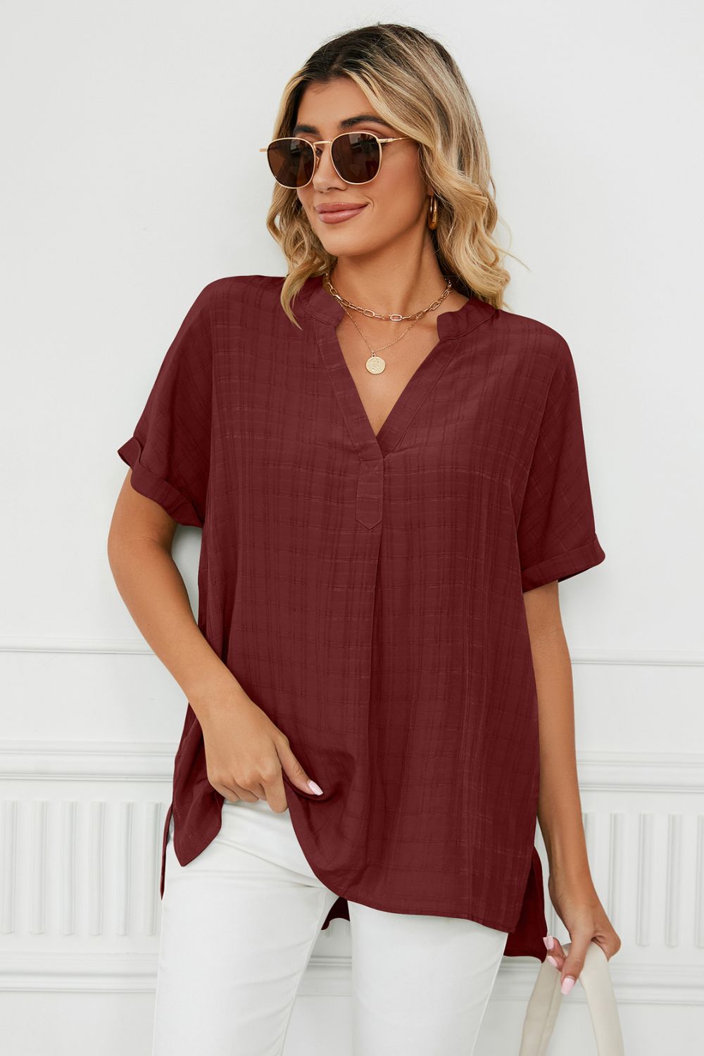 Blouse à manches courtes et revers à col cranté et fente latérale