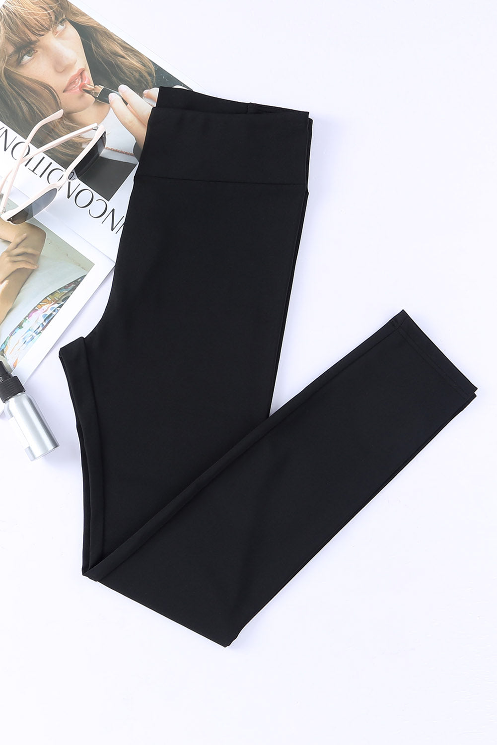 Leggings negros de cintura alta con control de barriga cruzados