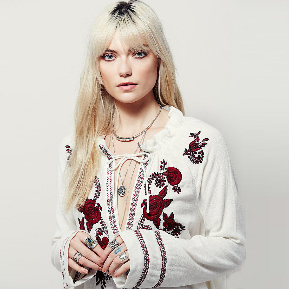 Bohemian lace-up top with embroidered flowers