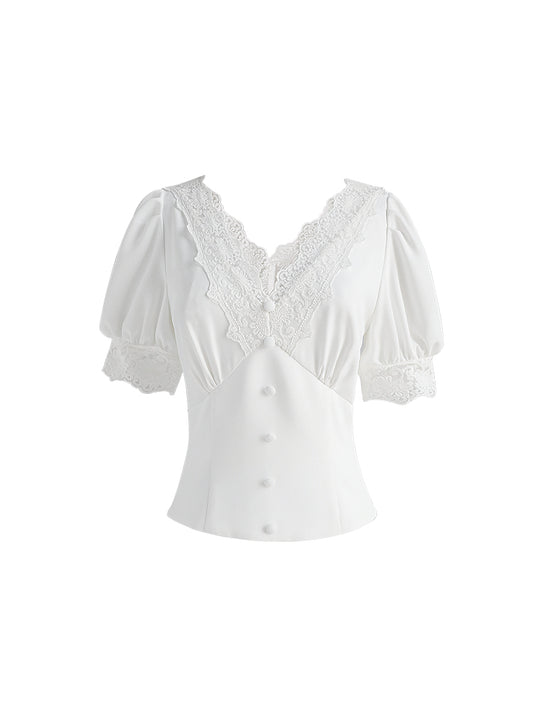 Blouse en dentelle ajourée col V