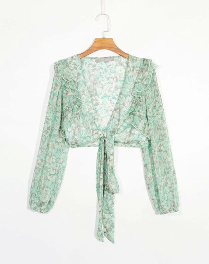 Floral print blouse with long sleeves and deep V-neck tie