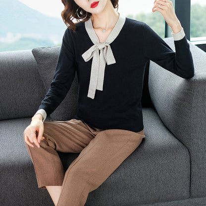 Bow tie round neck long sleeve knit top