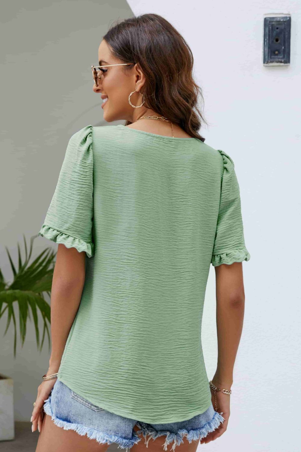 Blouse à col carré et manches bouffantes avec bordure à volants