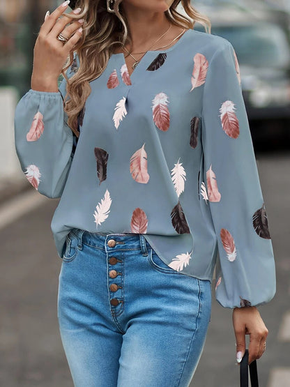 Blusa estampada de manga larga con cuello con muescas