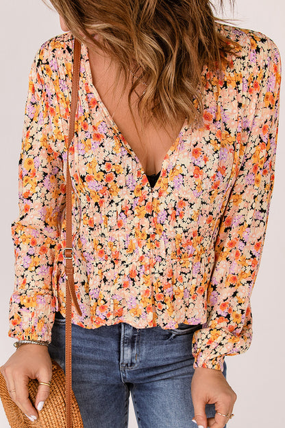 Floral Buttoned Plunge Peplum Blouse