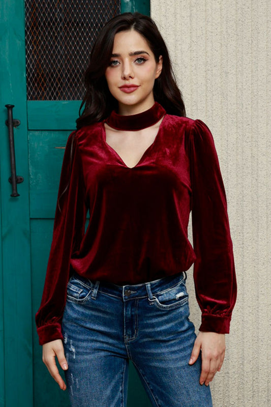 Blouse en velours à manches bouffantes et découpes