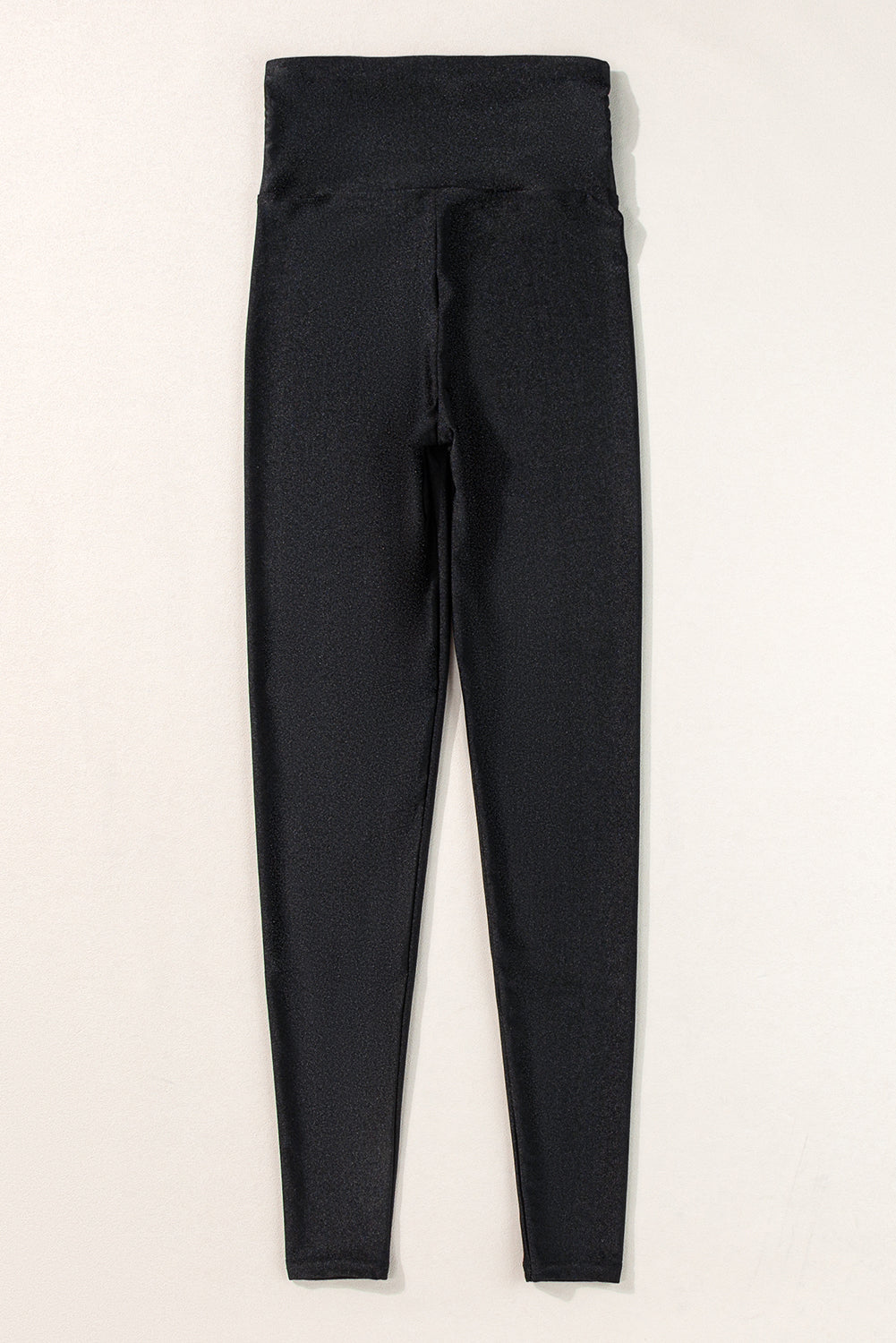 Leggings negros ajustados de talle alto con cinturilla