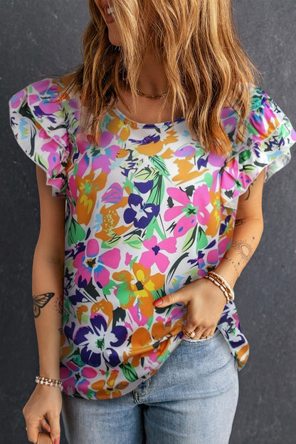 Blusa con mangas acampanadas y lazo floral en la espalda