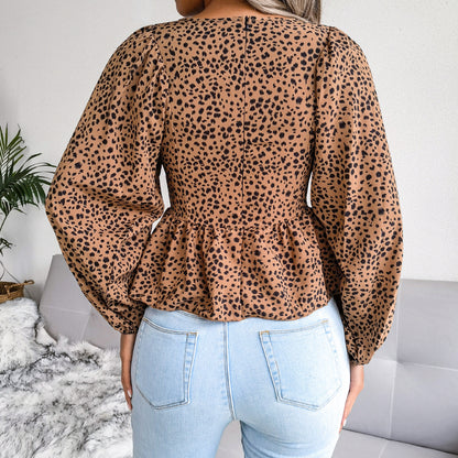 Blusa peplum con manga globo estampada