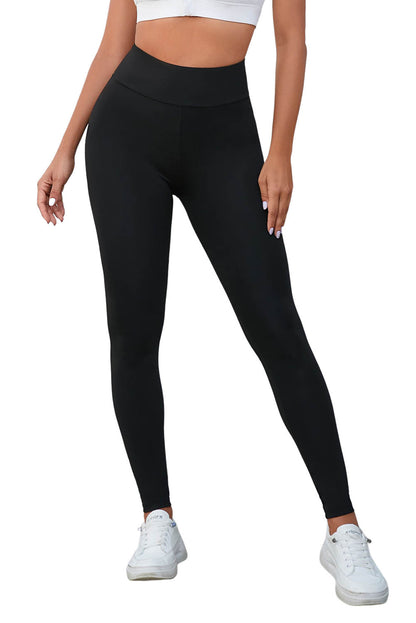 Leggings negros de cintura alta con control de barriga cruzados