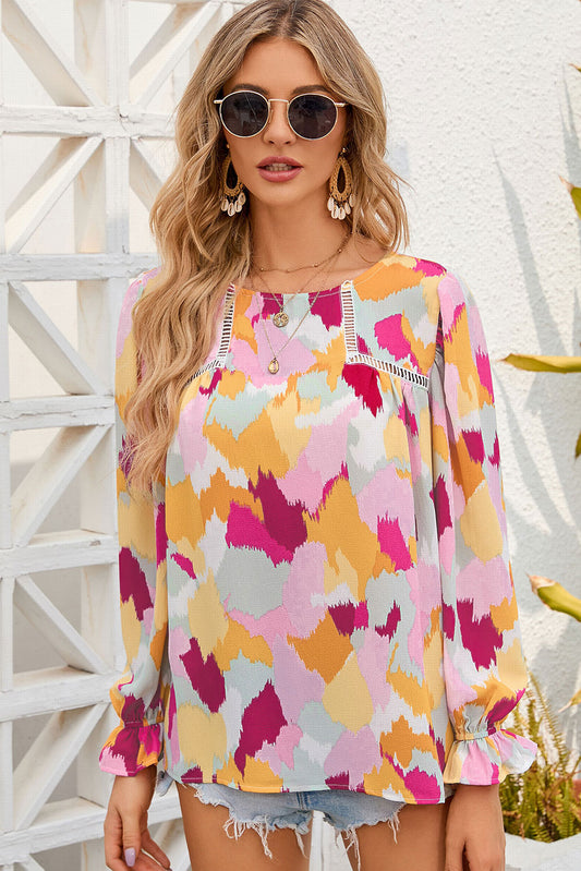 Blusa estampada con botones y mangas con volantes