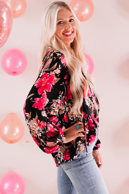 Blusa floral con cuello en V y manga globo