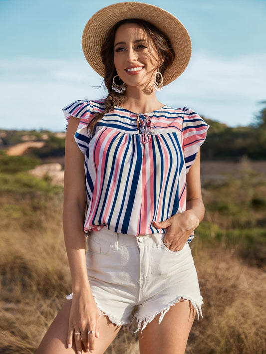 Blusa a rayas con mangas abullonadas y anudada