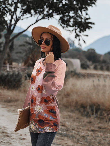 Blusa con hombros caídos y cremallera frontal con estampado floral