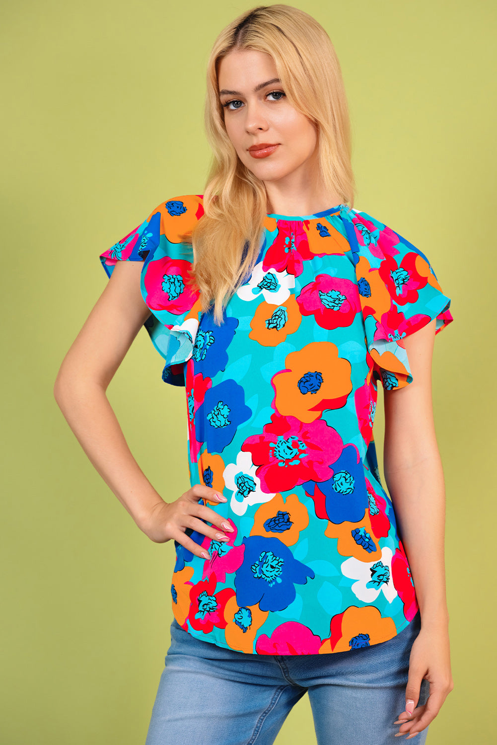 Blusa floral con cuello redondo y lazo