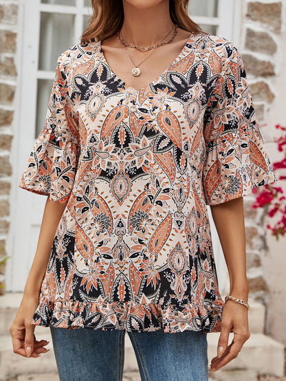 Blusa estampada con dobladillo con volantes y mangas con volantes