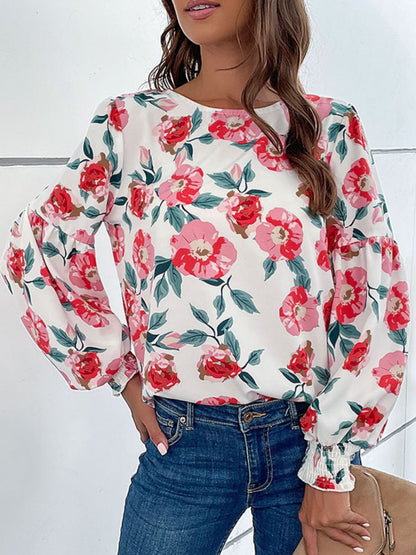 Blouse florale à manches longues bouffantes et col rond