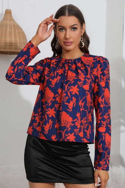 Blusa floral de manga larga abullonada