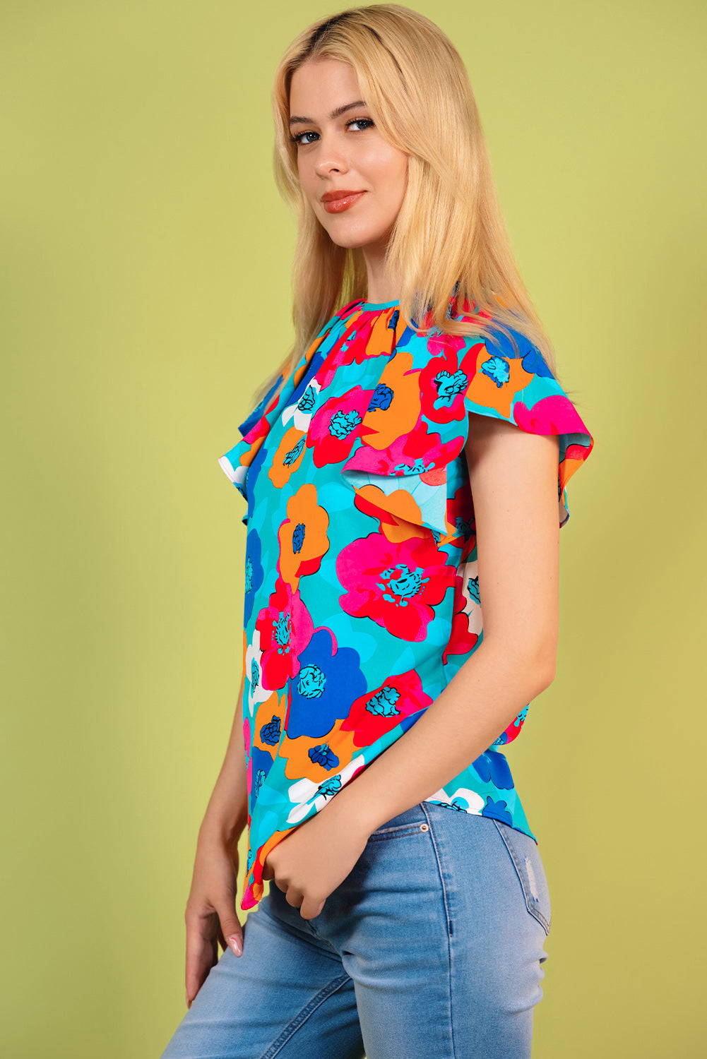 Blusa floral con cuello redondo y lazo