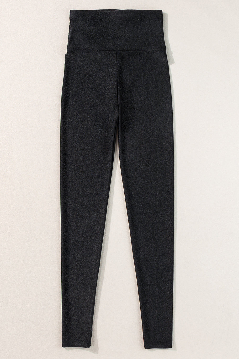 Leggings negros ajustados de talle alto con cinturilla