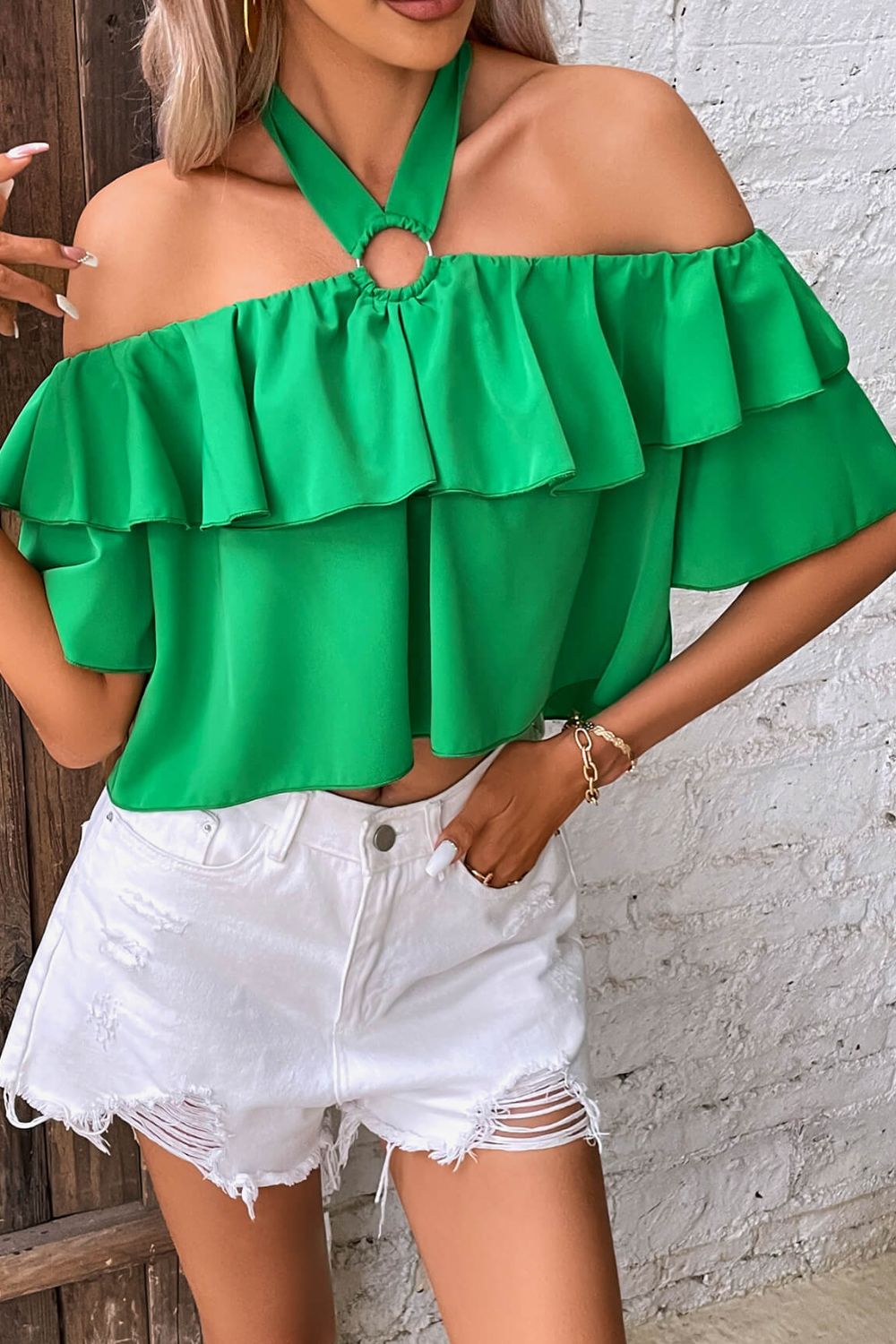 Blusa a capas con volantes y cuello halter