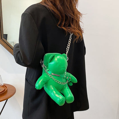 Bolso para teléfono móvil con cadena y diseño divertido de muñeca de moda