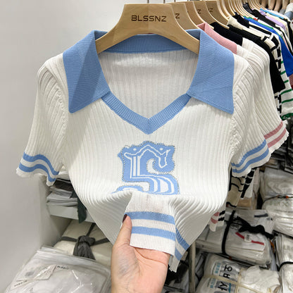 Pull tricoté à manches courtes et col polo pour femme