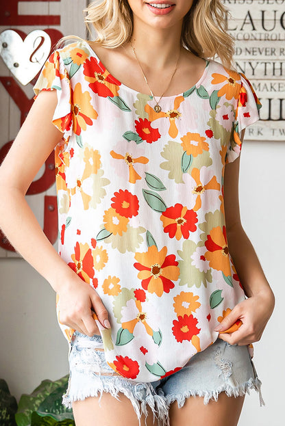 Blusa floral con cuello redondo y mangas acampanadas