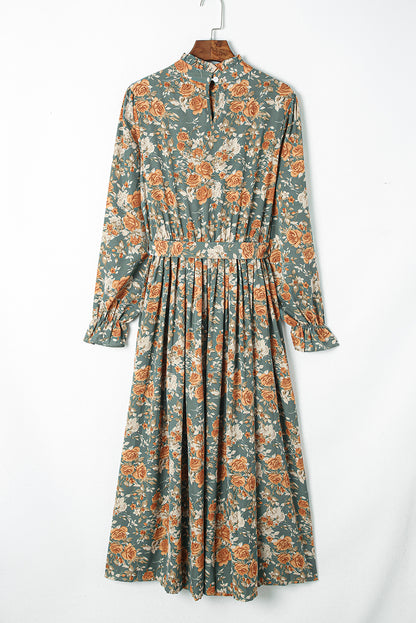 Robe longue à fleurs plissée verte à manches longues avec cravate