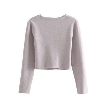 Women's hollow knit sweater