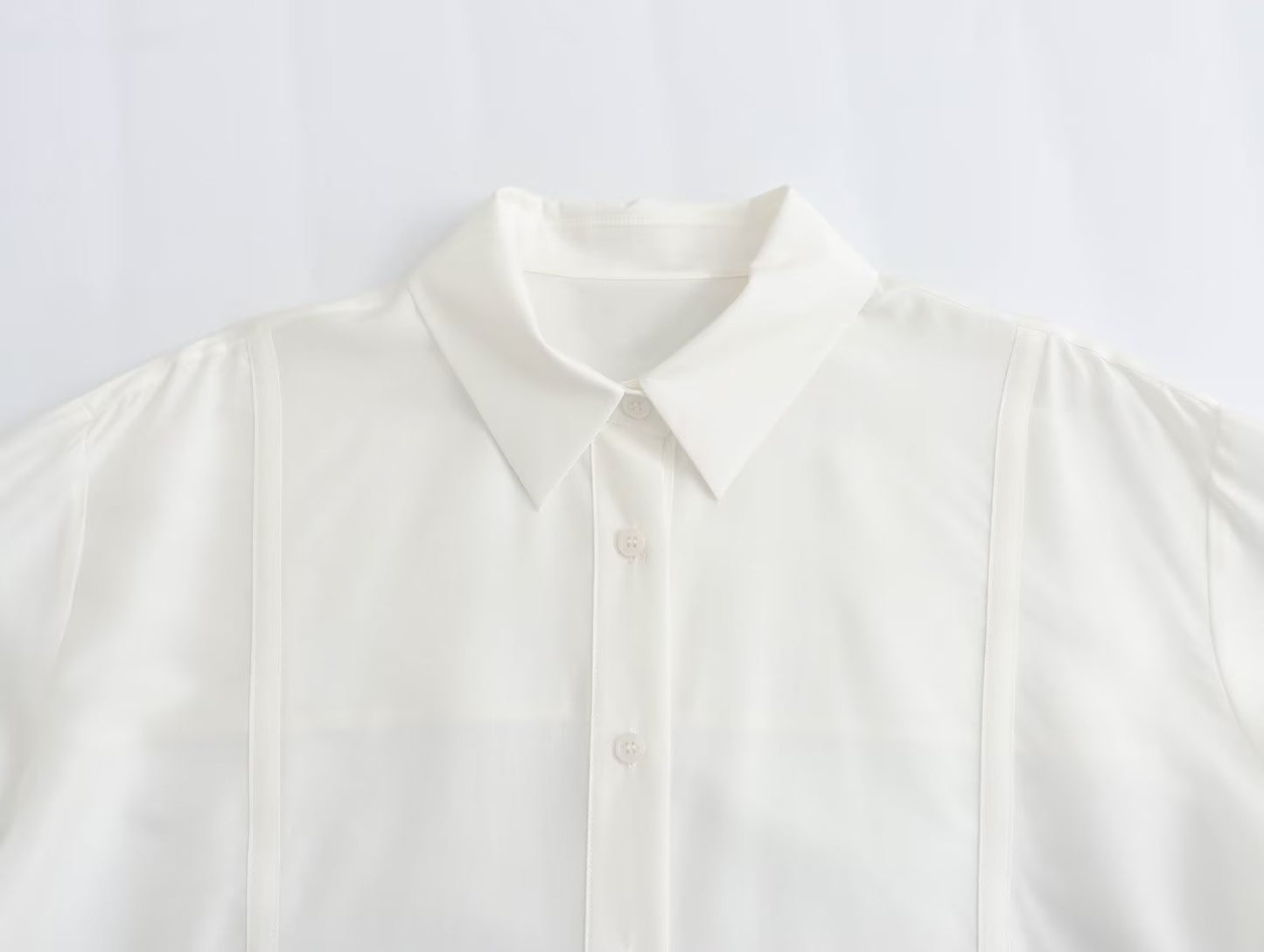 Chemise élégante à effet drapé blanc ample et assortie avec tout pour femme