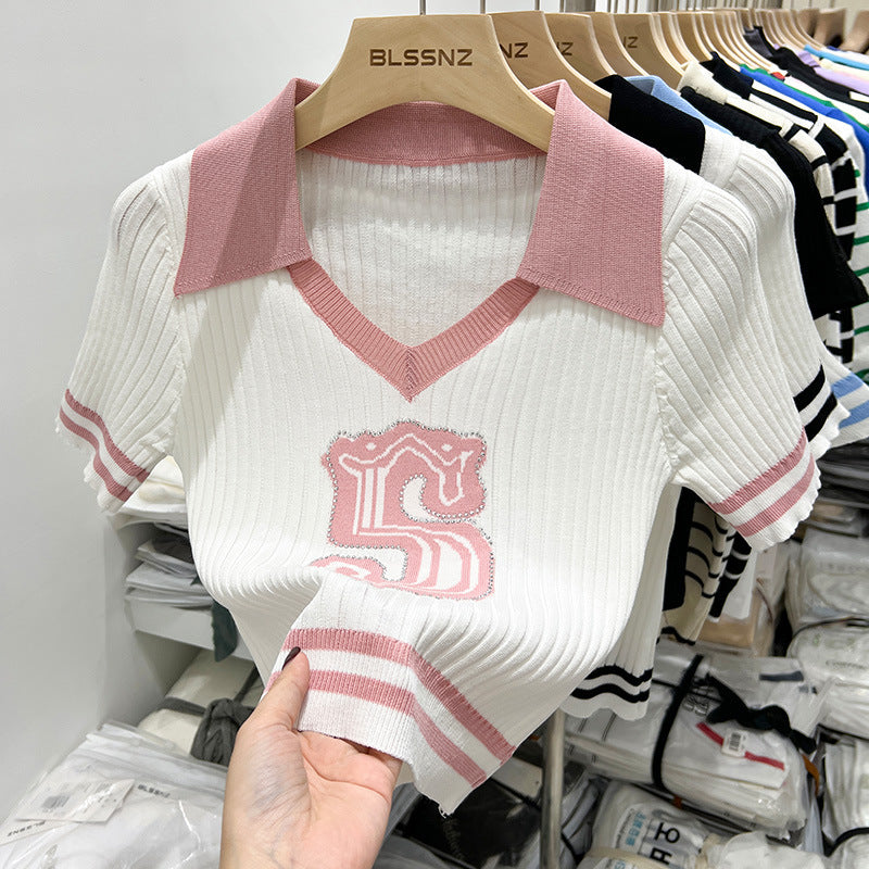 Pull tricoté à manches courtes et col polo pour femme