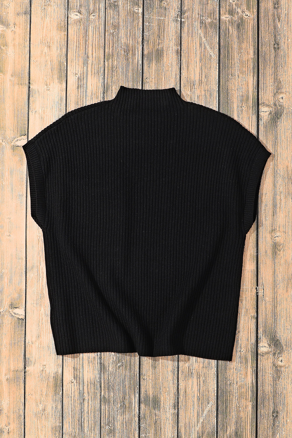 Pull noir à manches courtes en tricot côtelé avec poche plaquée