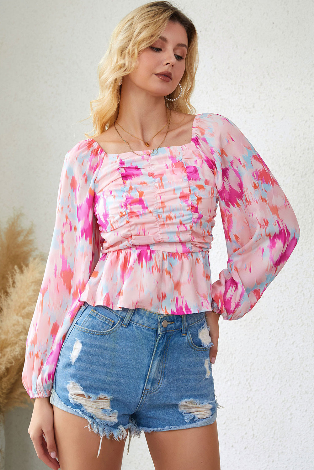 Blusa estampada con cuello cuadrado y manga raglán