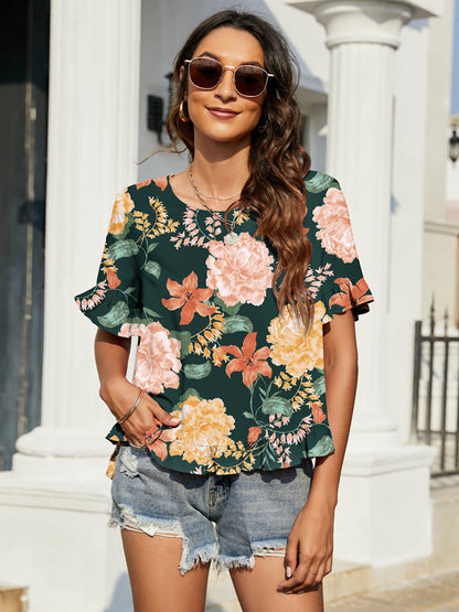 Blusa floral con mangas con volantes y volantes