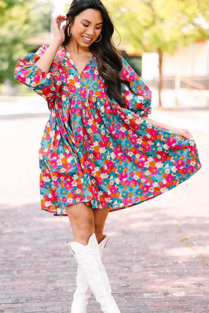 Vestido babydoll con manga de burbuja y cuello dividido con lazo y estampado floral azul cielo